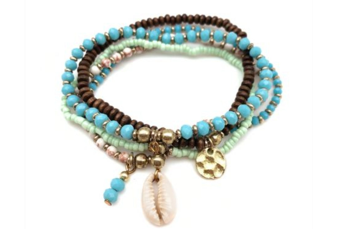 Sachi set of five stretch bracelets with shells and beads.